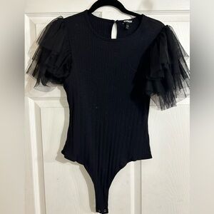 Tulle ruffle sleeved bodysuit.